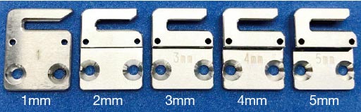 切りシロ量調整スペーサー