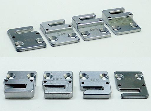 切りシロ量調整スペーサー